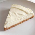Slice Vegan Vanilla Cheesecake On A White Plate