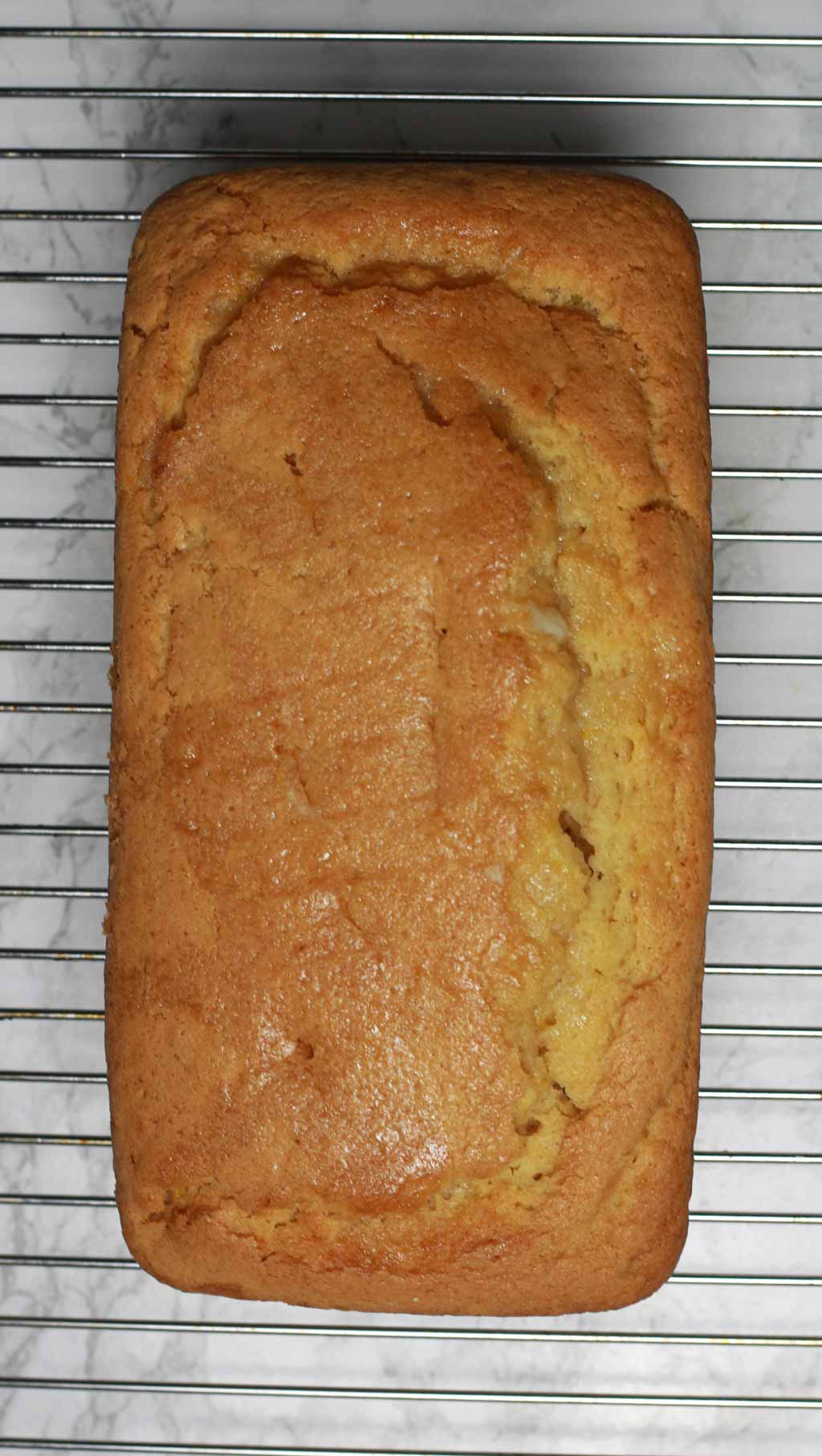 Loaf Cake Cooling On A Wire Rack