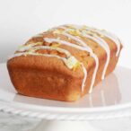 Thumbnail of loaf cake with drizzled white icing on top