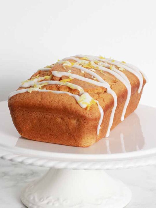 Thumbnail of loaf cake with drizzled white icing on top