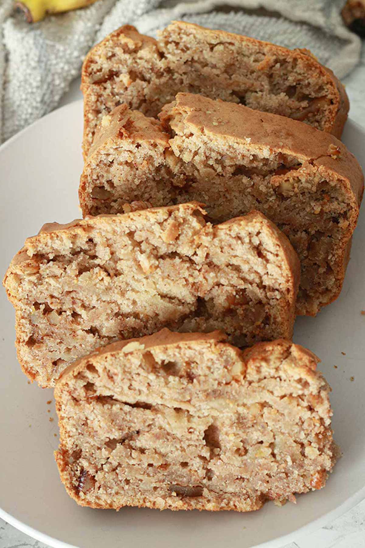 Slices Of egg-free Banana Bread On A White Plate