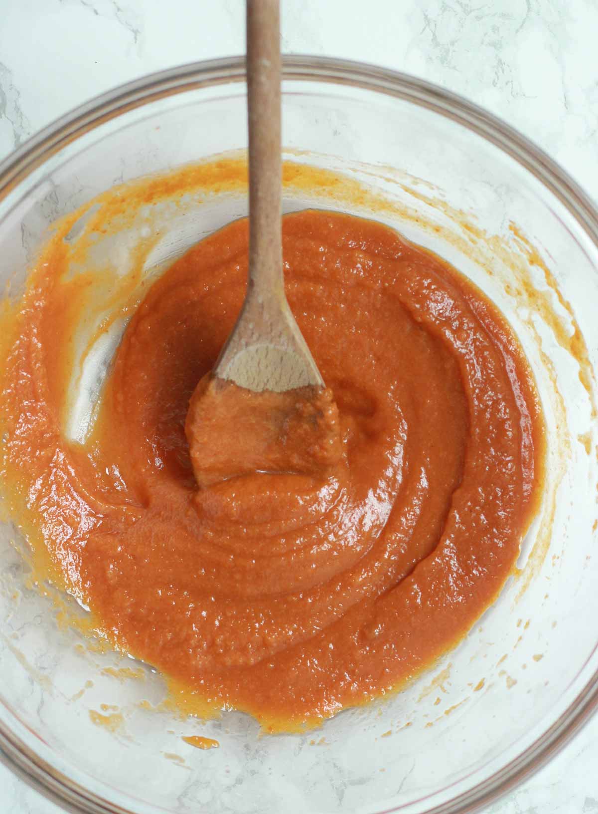 An Orange Mixture In A Bowl