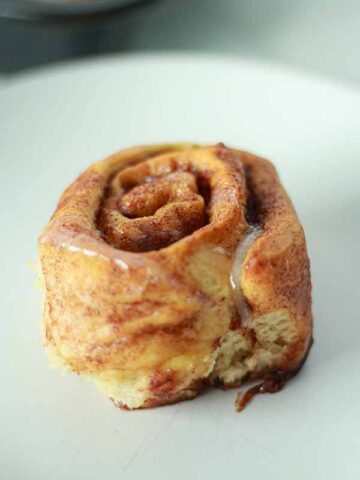 Image Of Vegan Cinnamon Roll On A Plate