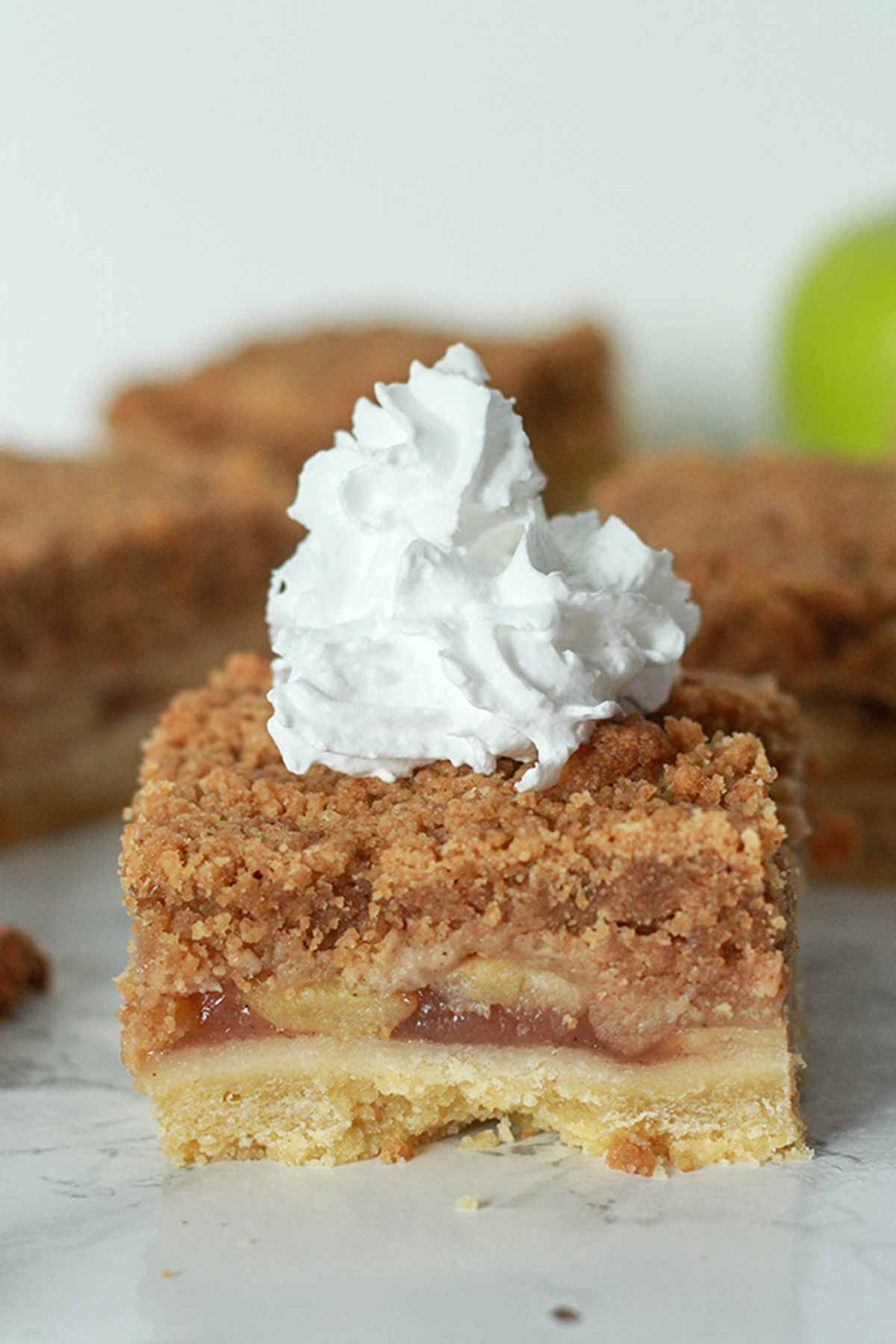 Vegan Apple Crumble Bar With Cream On Top