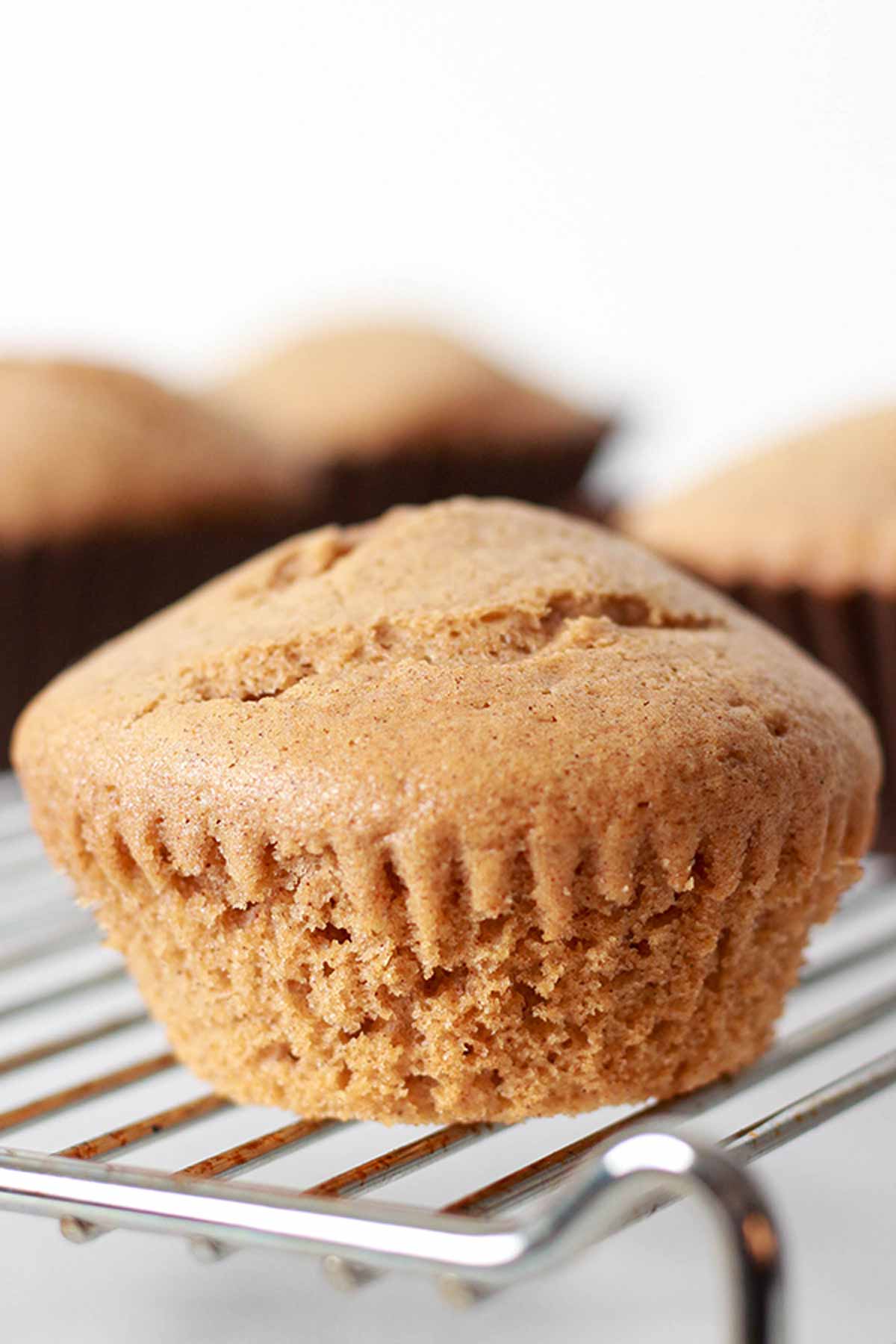 Eggless cinnamon Muffin On Wire Rack