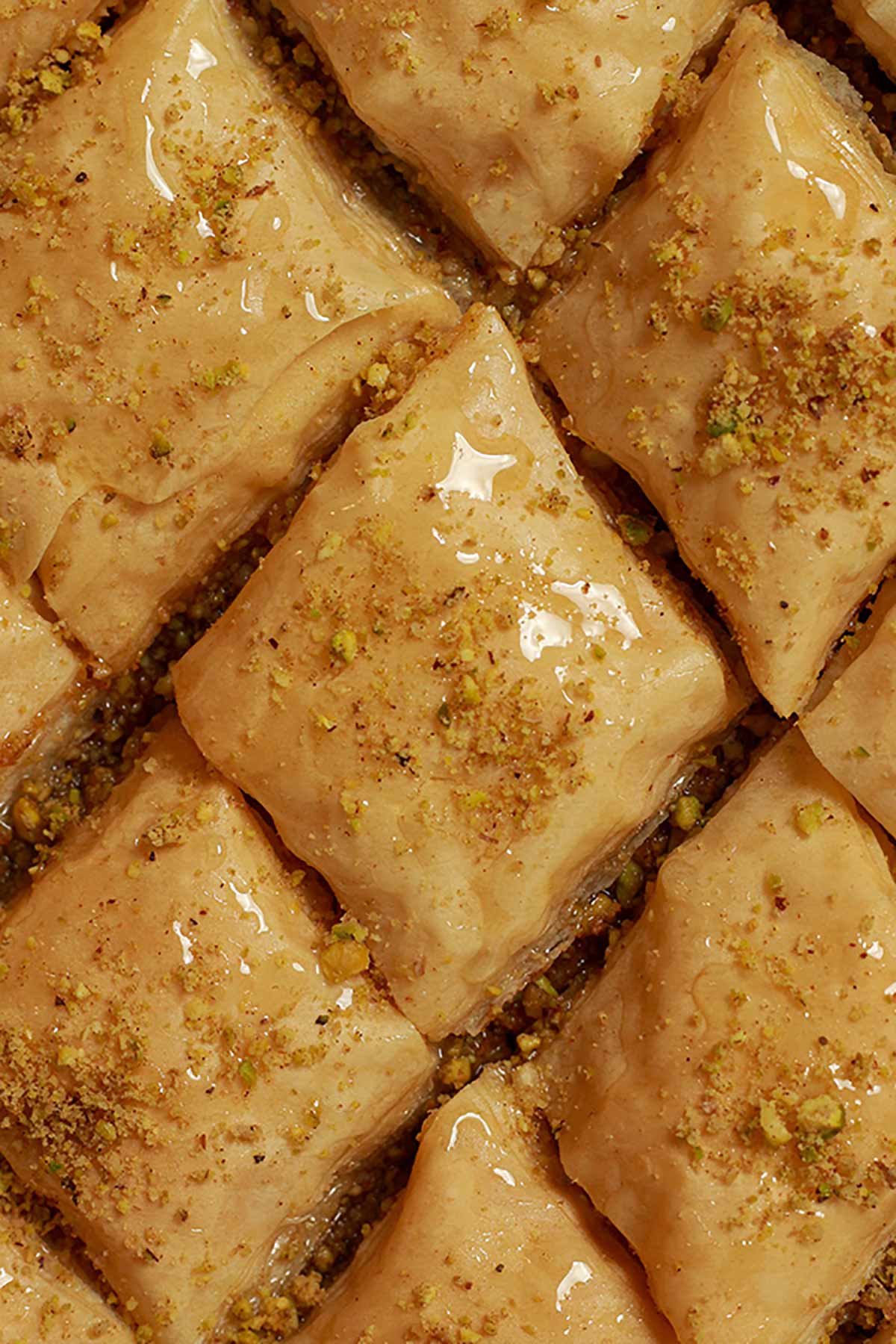 Close Up Of Baklava In Tray With Syrup Poured On Top