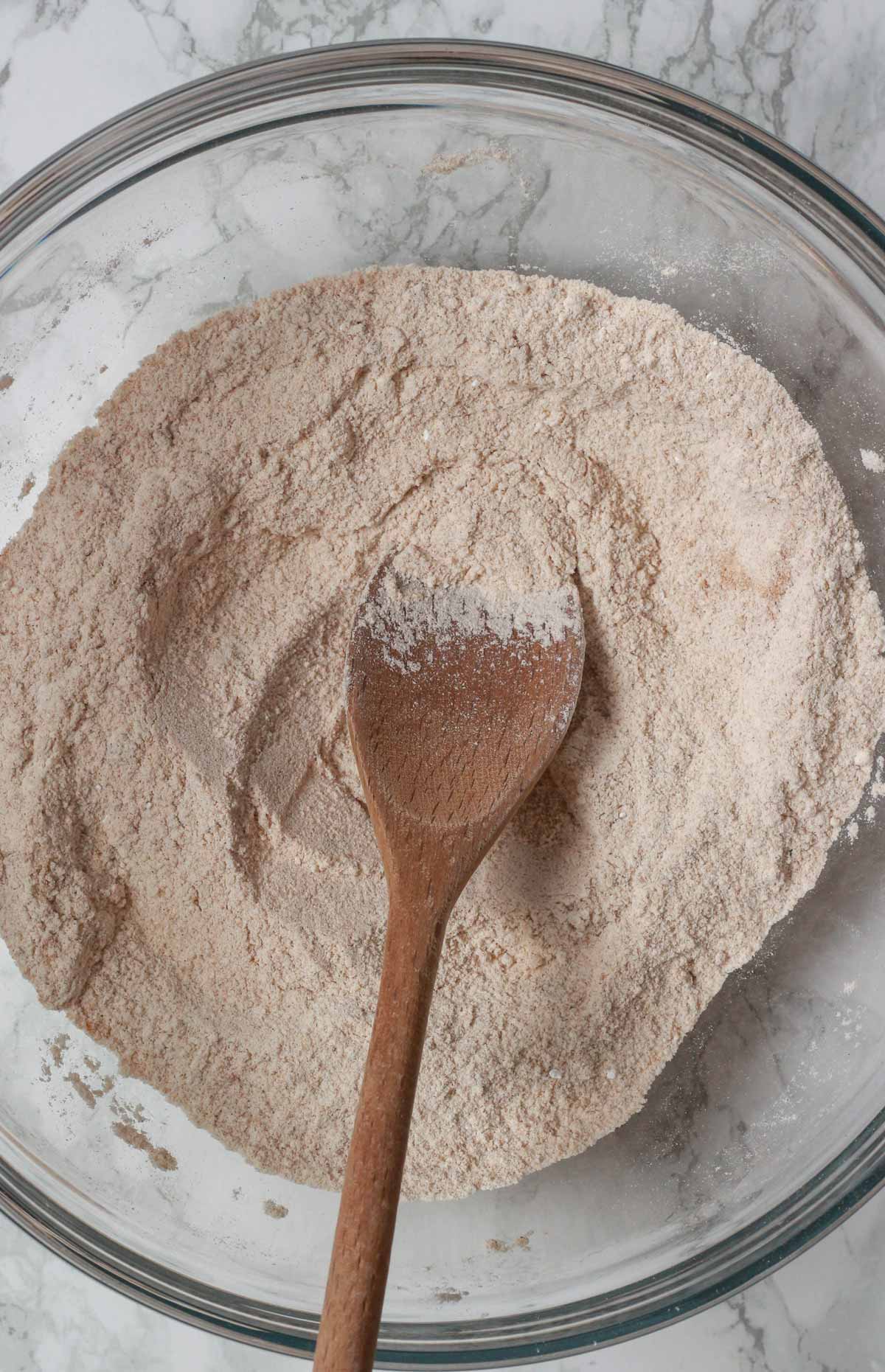 Dry Ingredients Mixed Together In A Glass Bowl