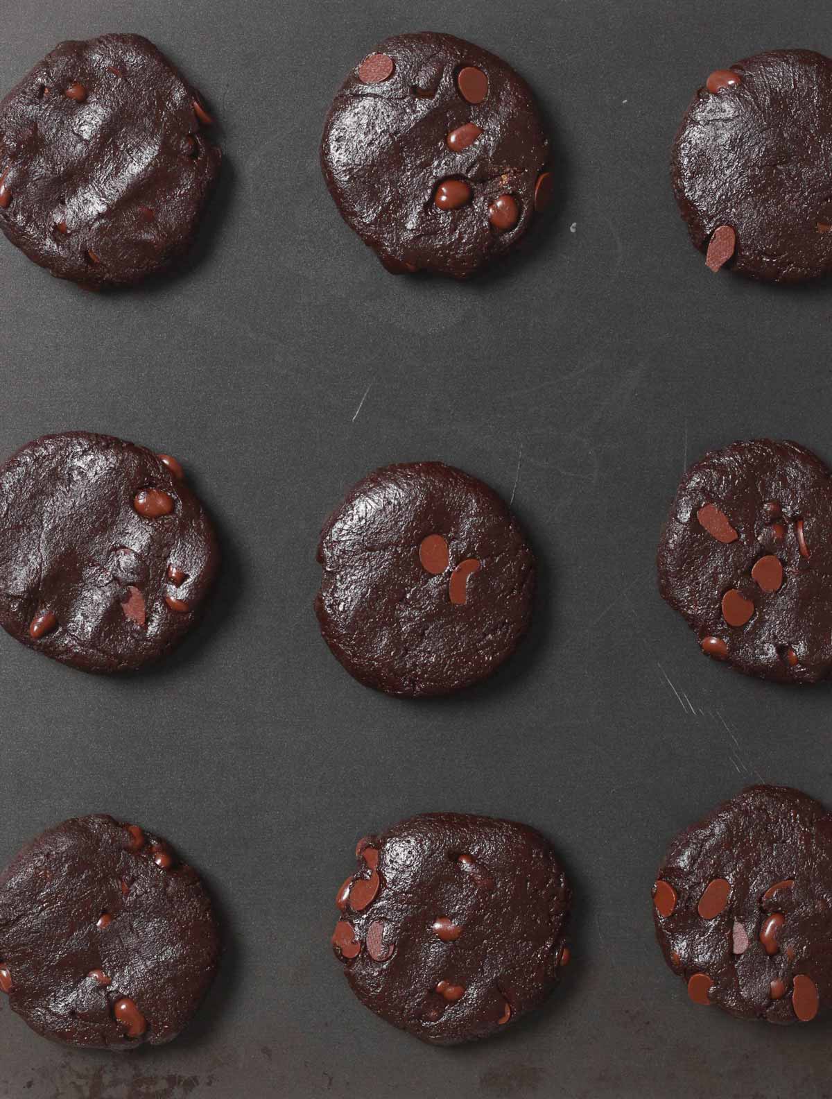 Cookie Dough Discs On Baking Tray