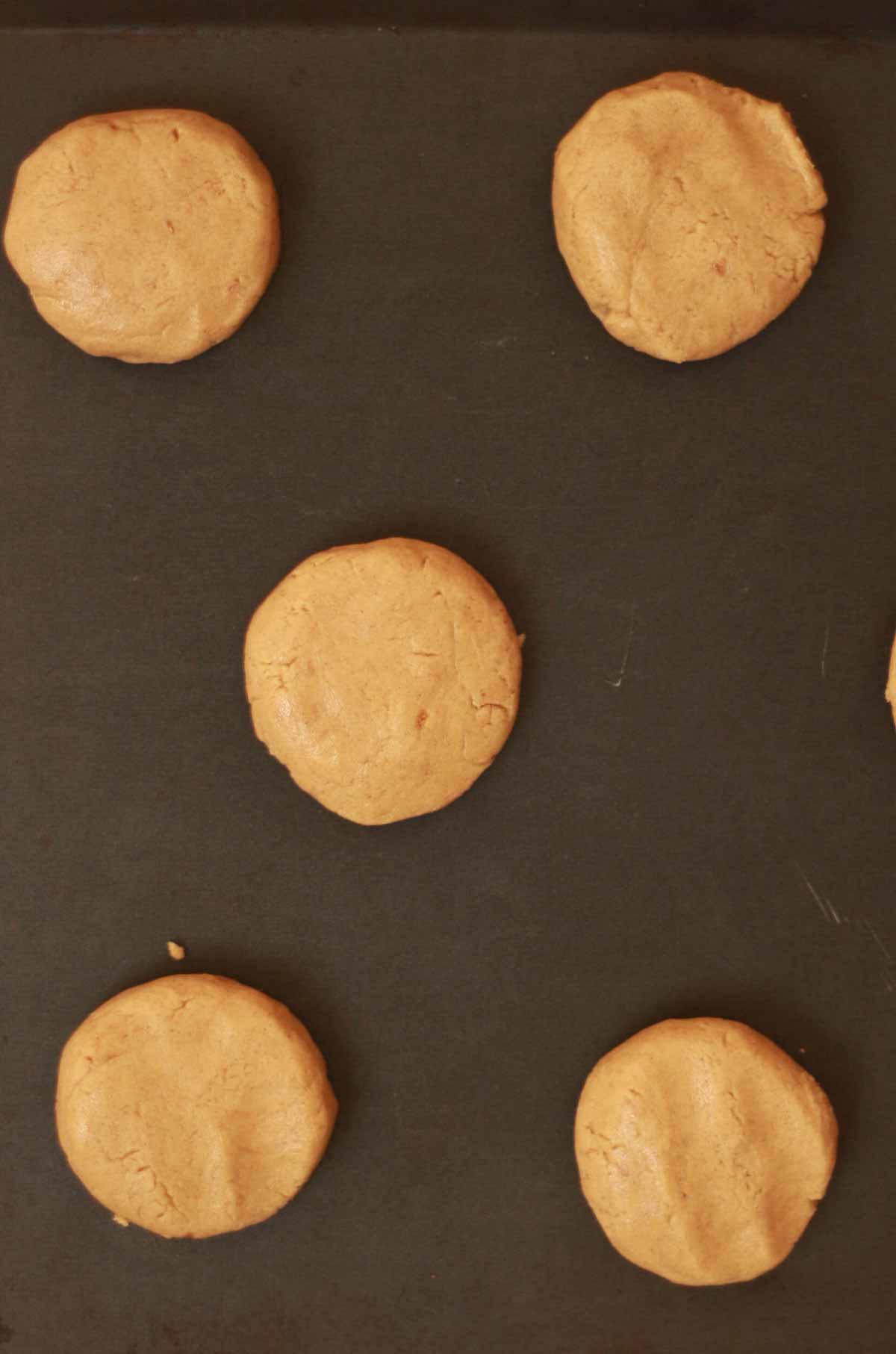 Discs Of Cookie Dough On Tray