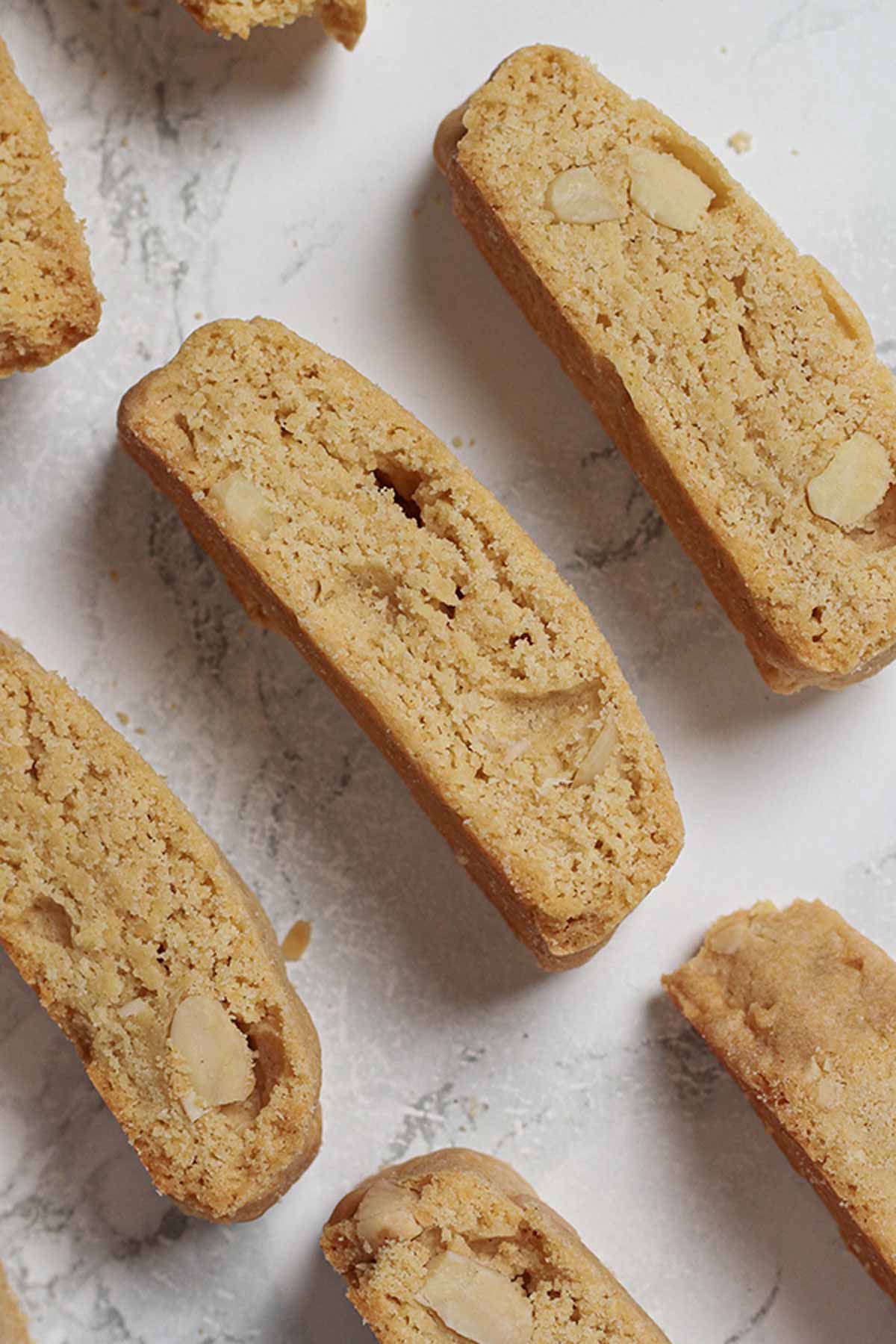 Slices Of Almond Biscotti On A White Surface