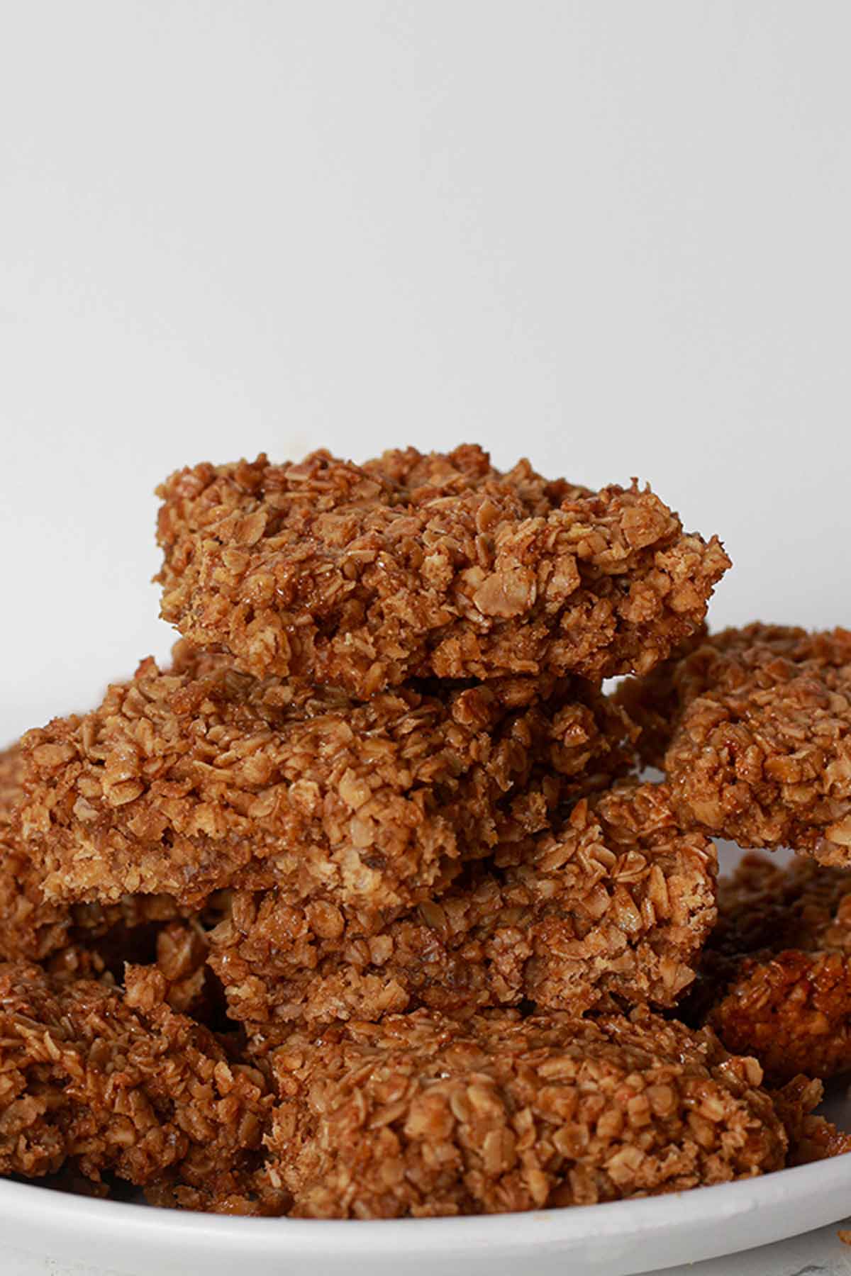 Pile Of Vegan Ginger Flapjacks On A Plate