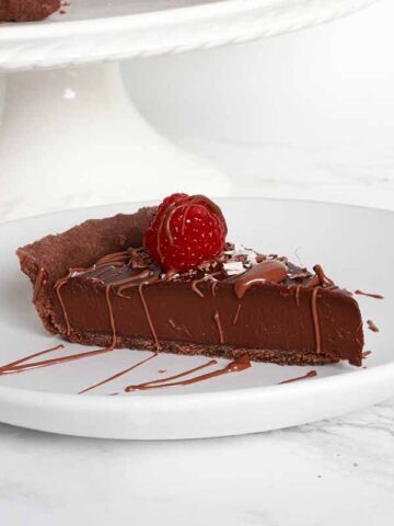 Slice Of Chocolate Tart With Raspberry On Top