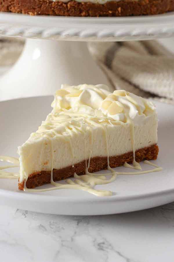 Vegan White Chocolate Cheesecake Slice On Plate