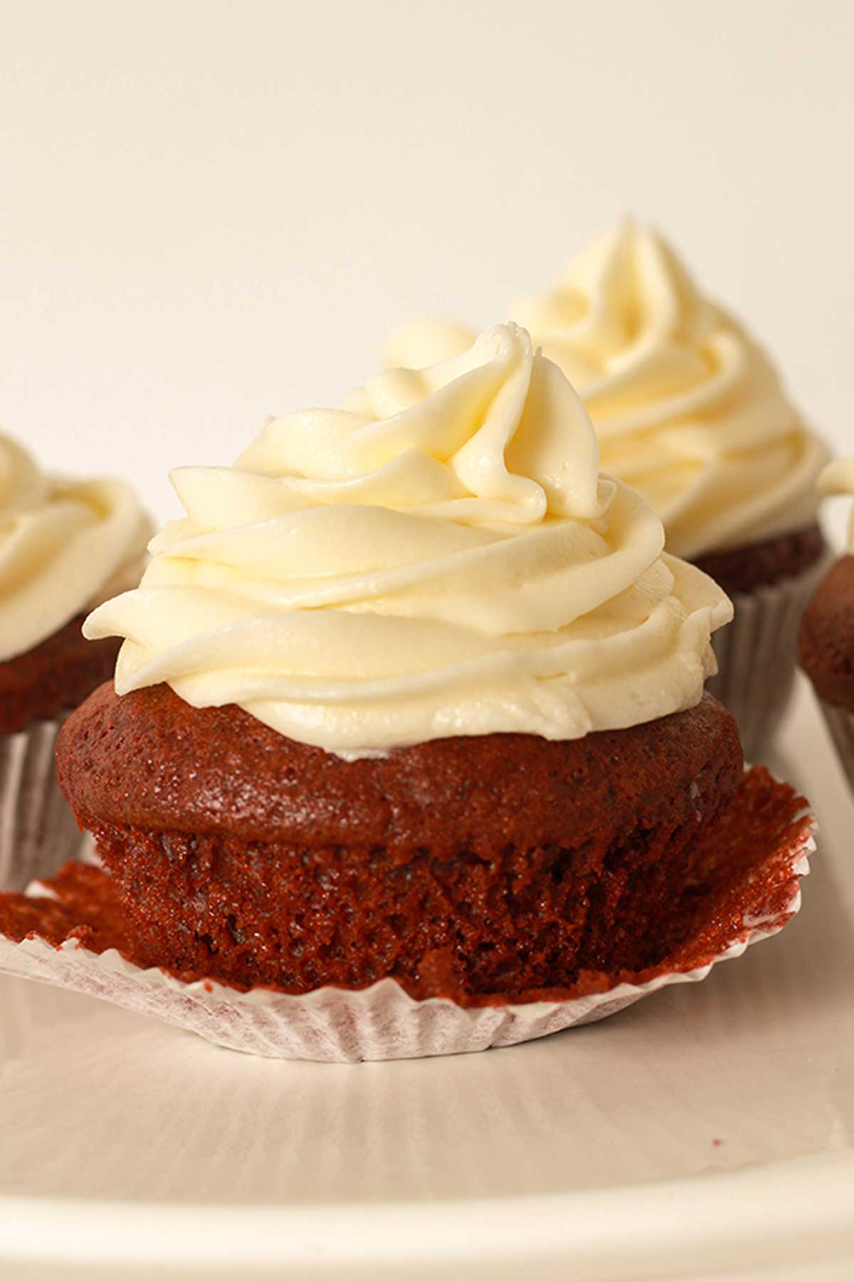 Icing on a red velvet cupcake