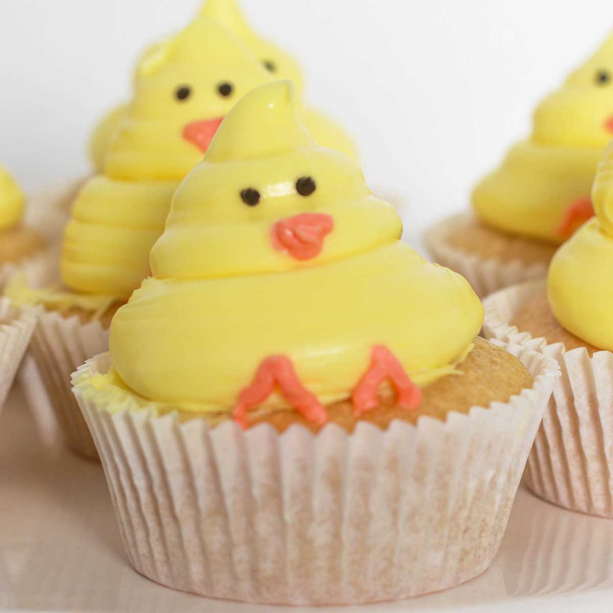 Easter Cupcakes On A White Cake Stand