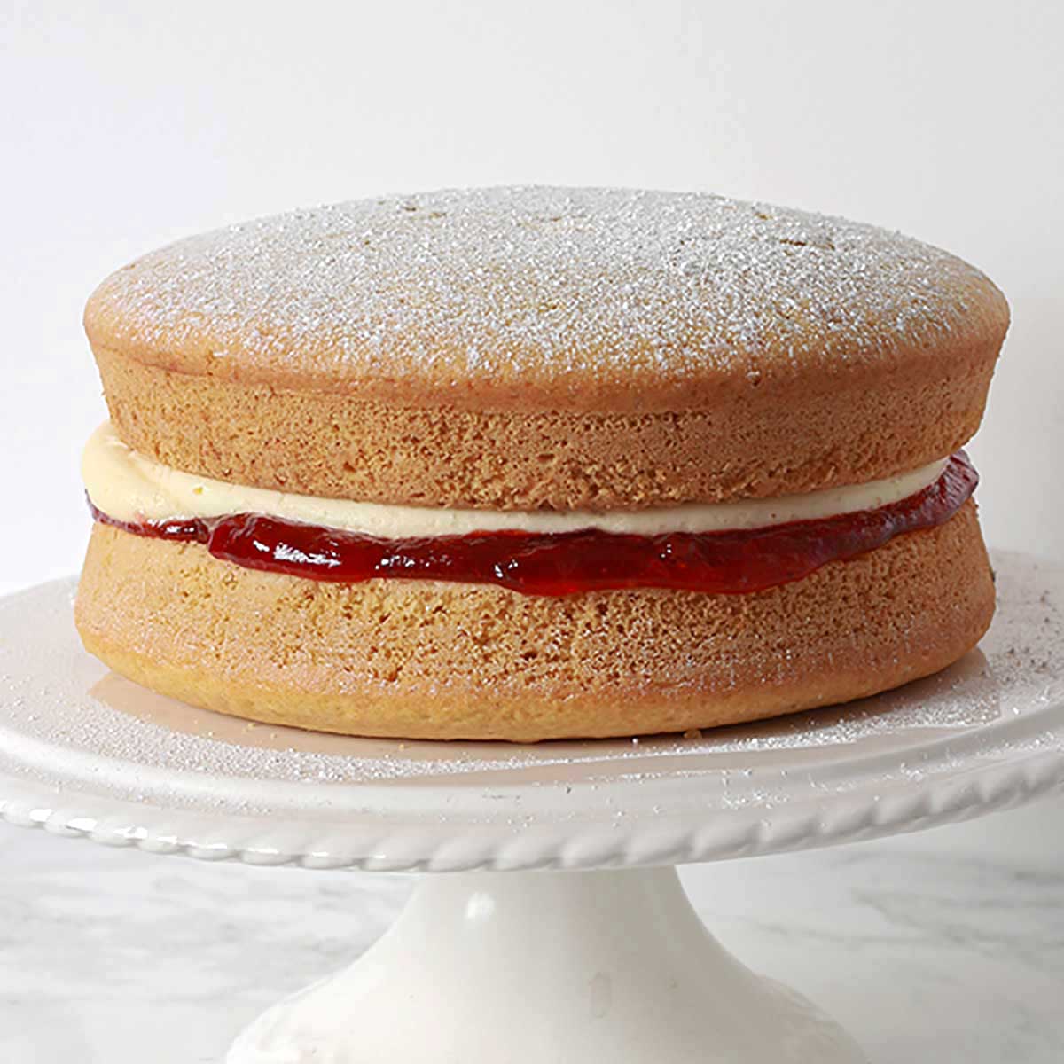 Dairy Free Sponge Cake On A Cake Stand- mother's day desserts