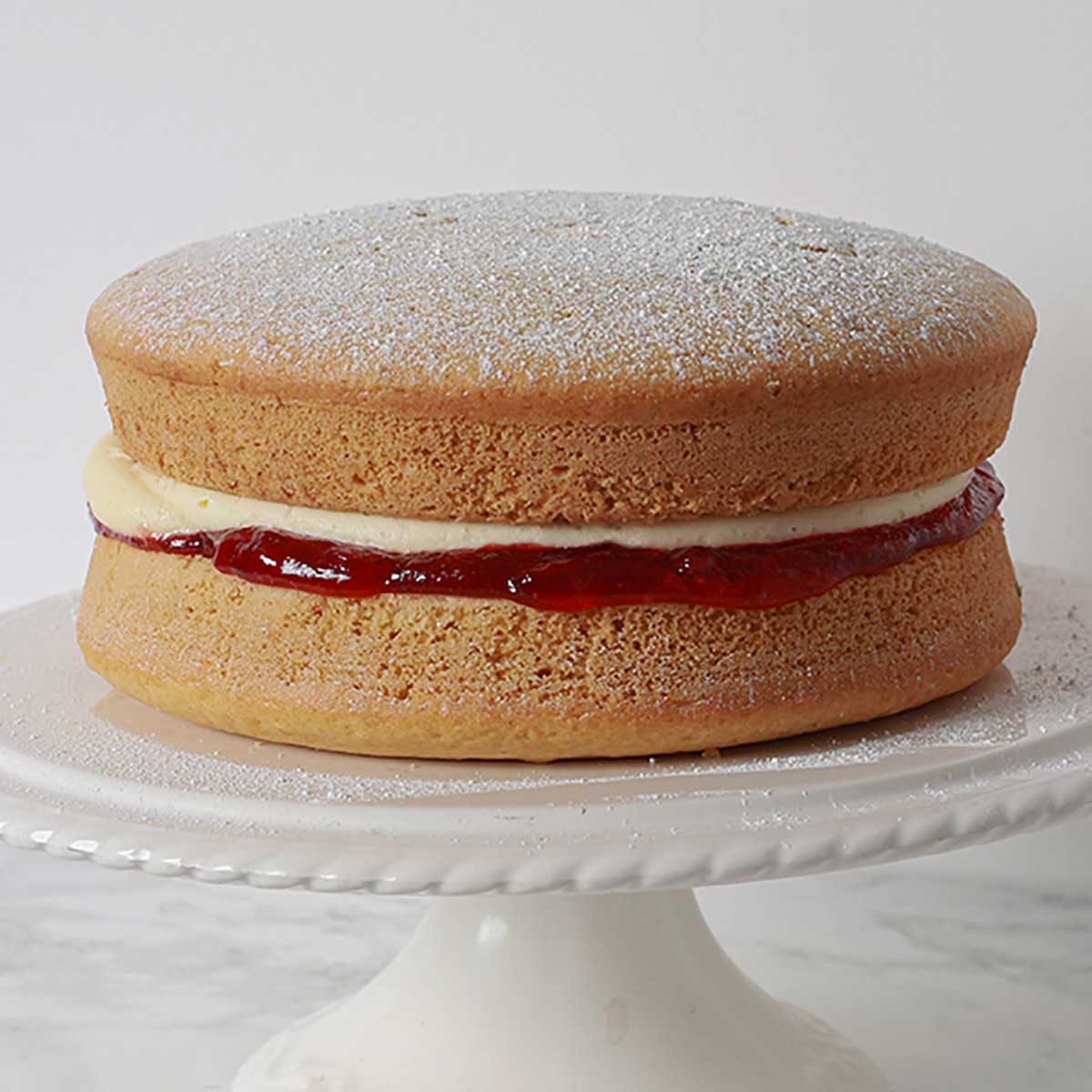 Dairy Free Sponge Cake On A Cake Stand