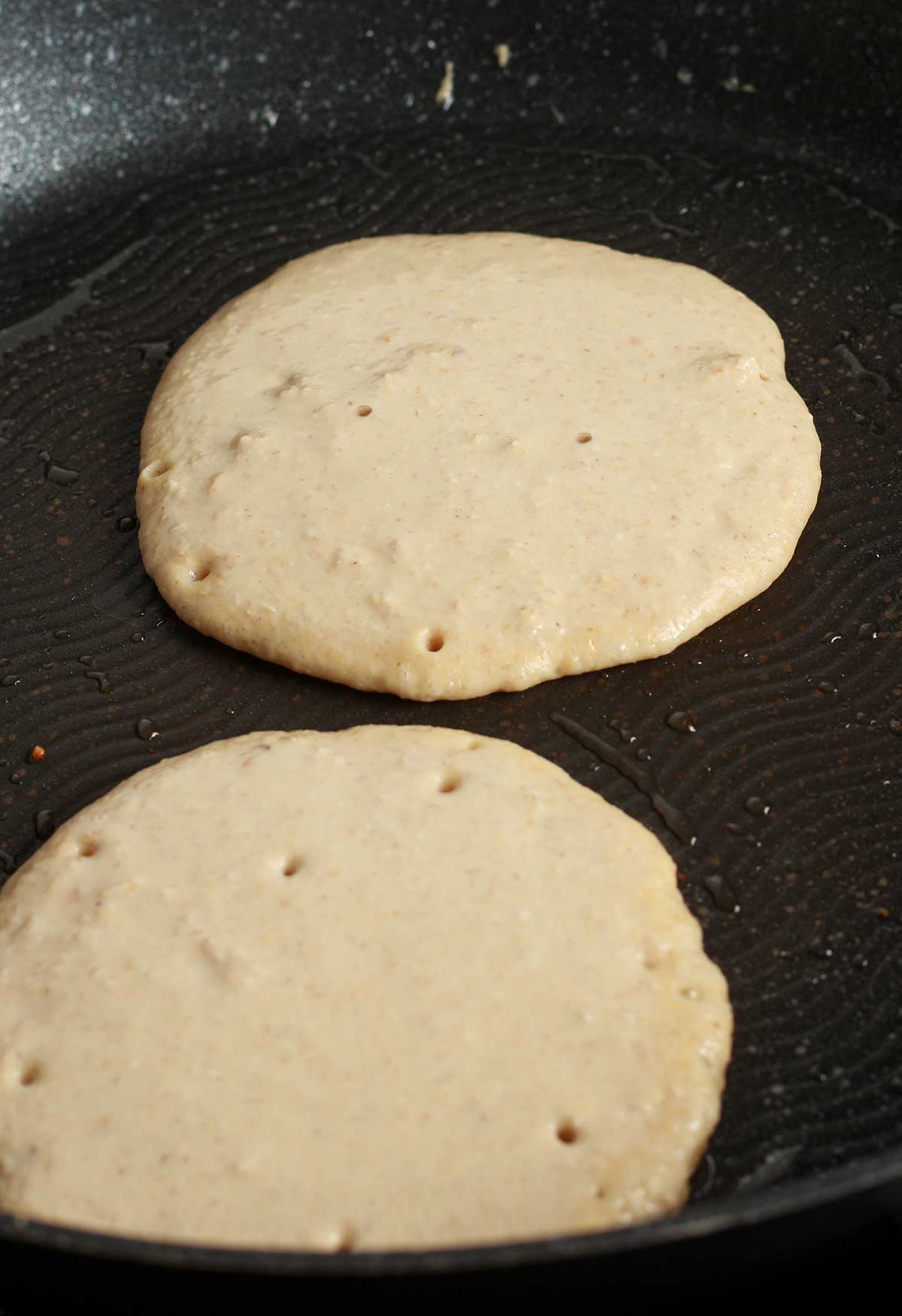 Pancakes Frying In A Pan