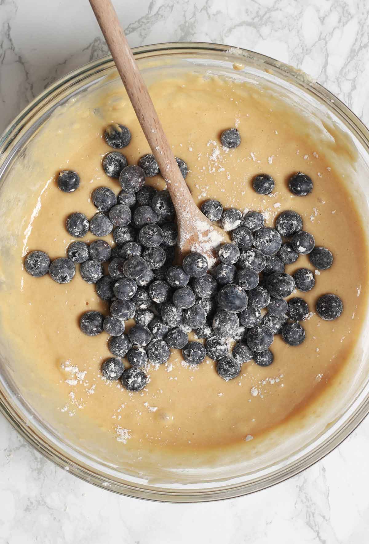 A Bowl Full Of Blueberry Muffin Batter