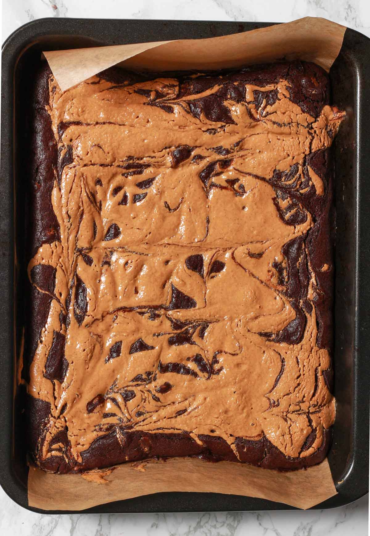 Eggless Peanut Butter Brownies In Tin After Baking