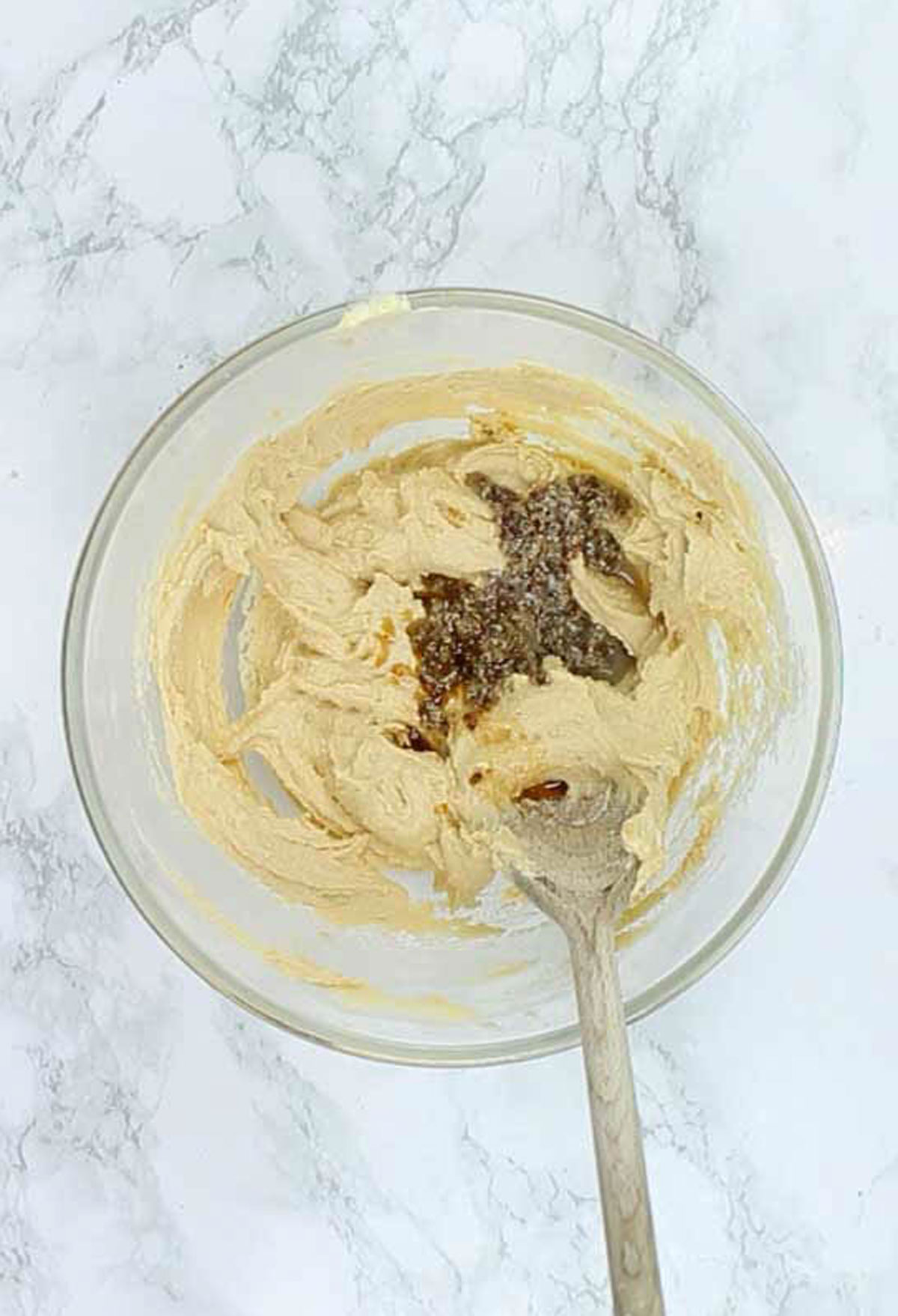 Butter, Sugar And Flax Seeds In A Glass Bowl