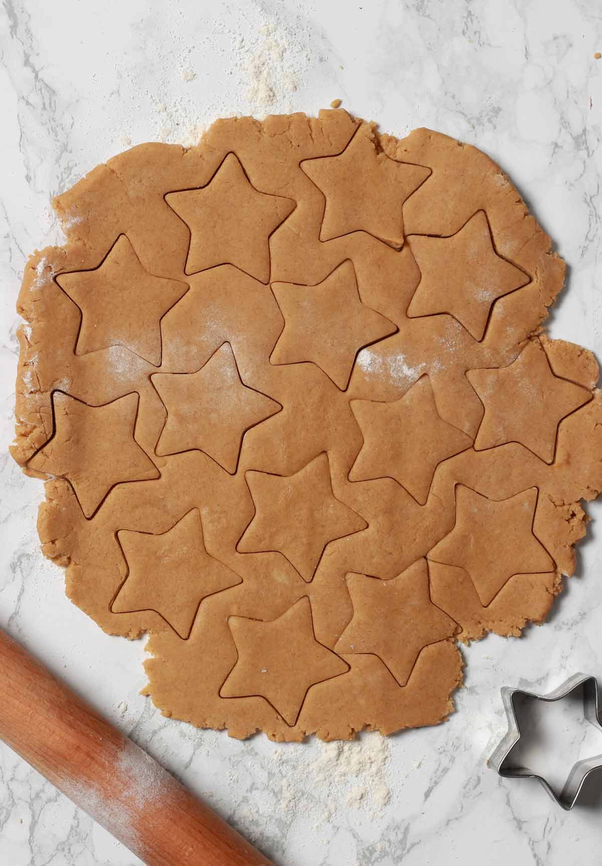 Dough Rolled On Surface With Star Shapes Cut Out