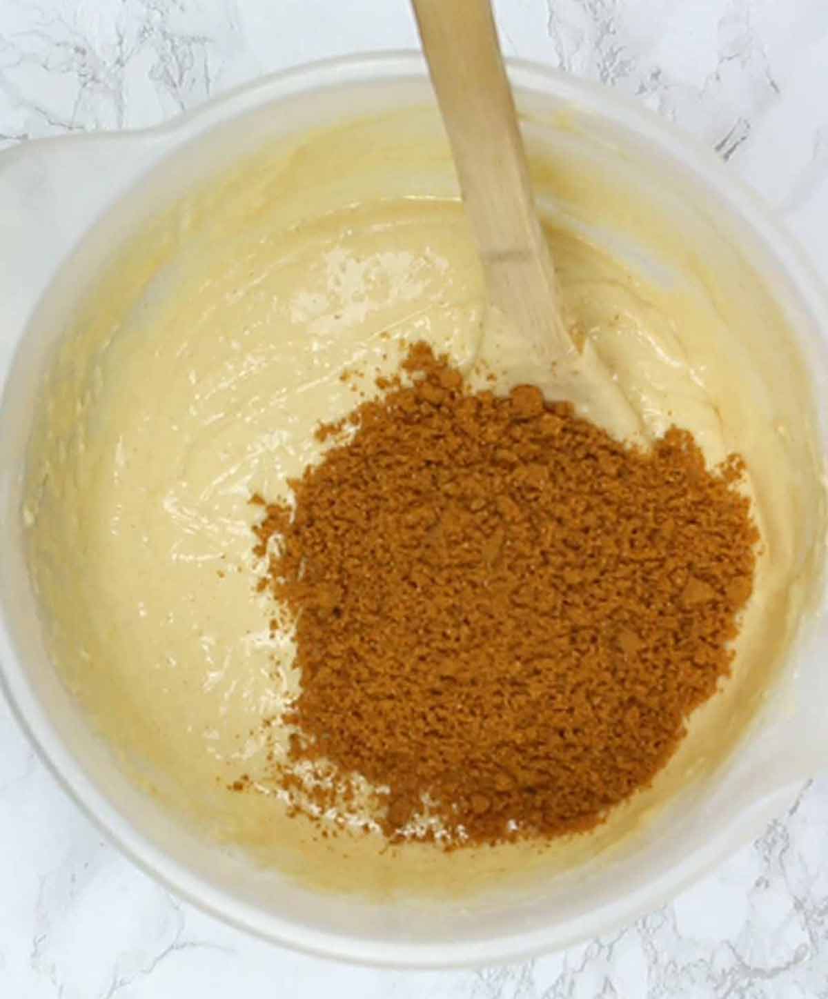 Cake Batter In Bowl With Biscuit Crumbs