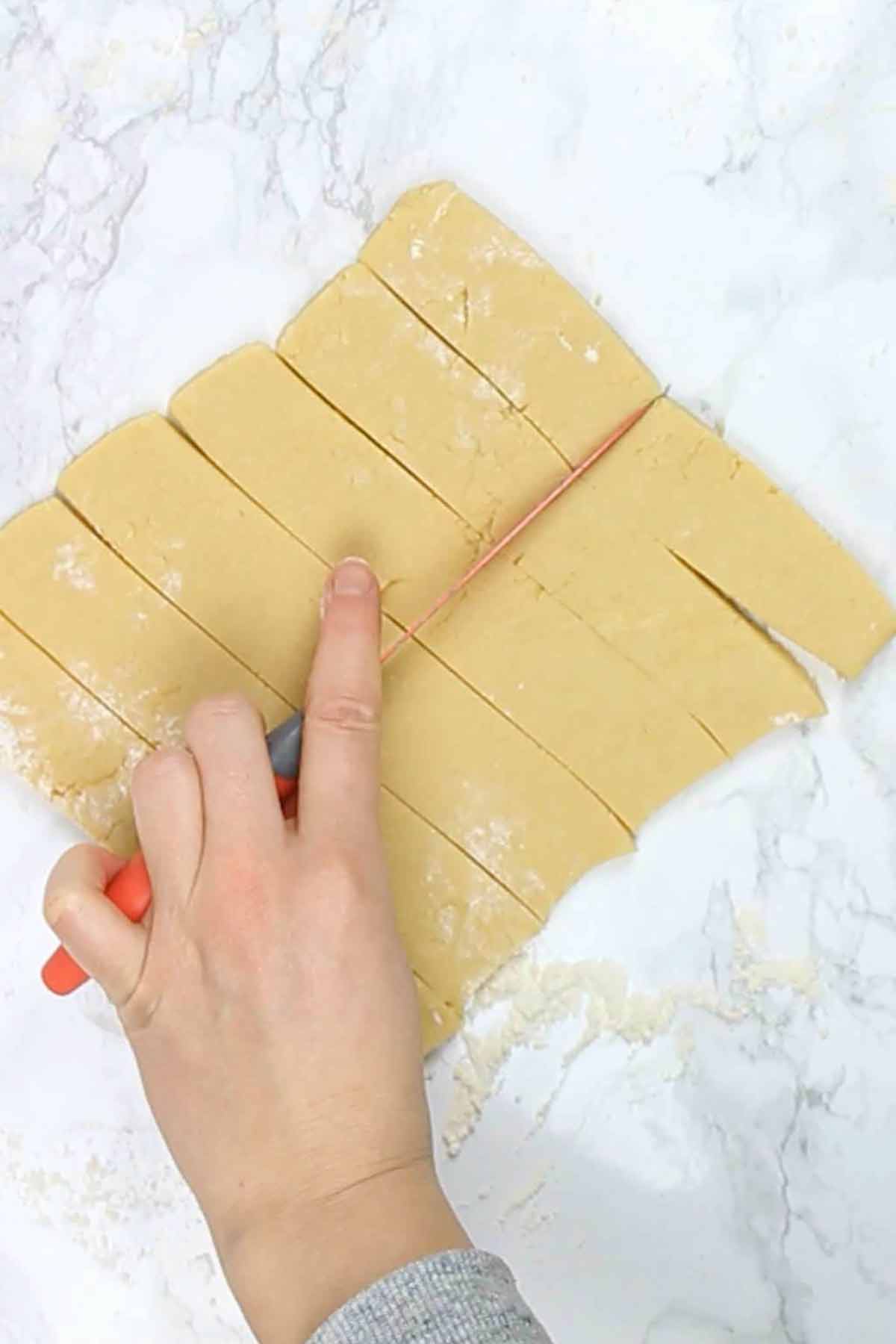 Cutting Dough Into Finger Shapes