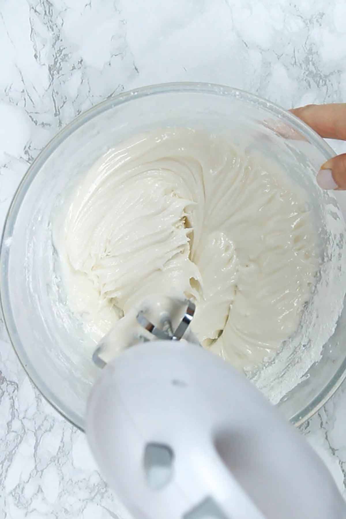 Whisking Eggless Royal Icing In A Bowl