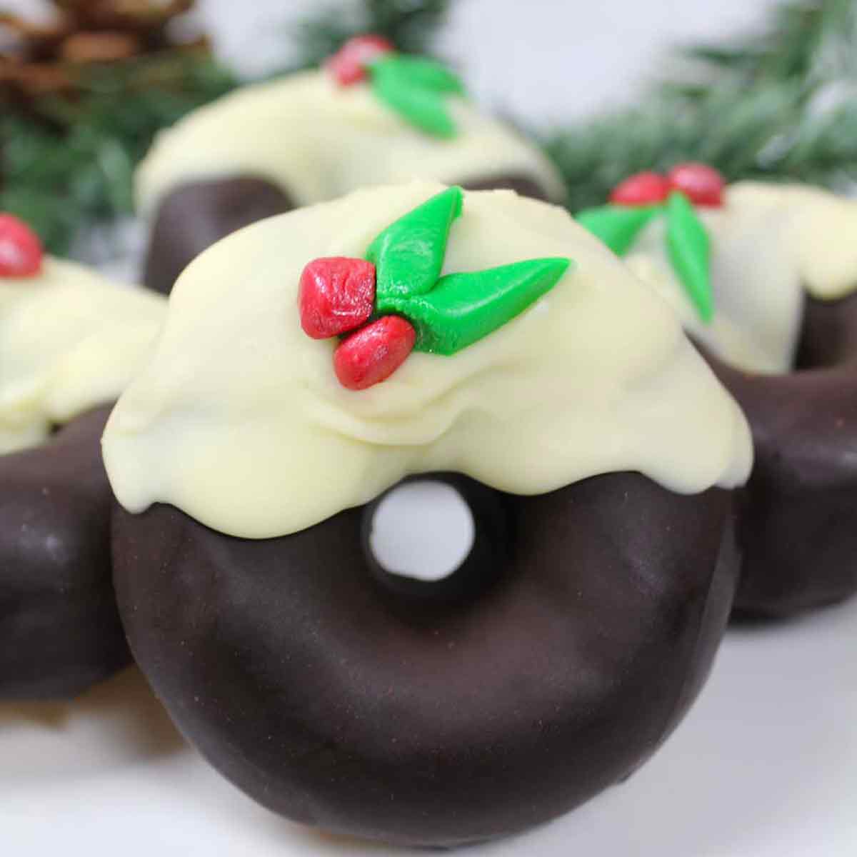 Vegan Christmas Donuts decorated to look like Christmas puddings