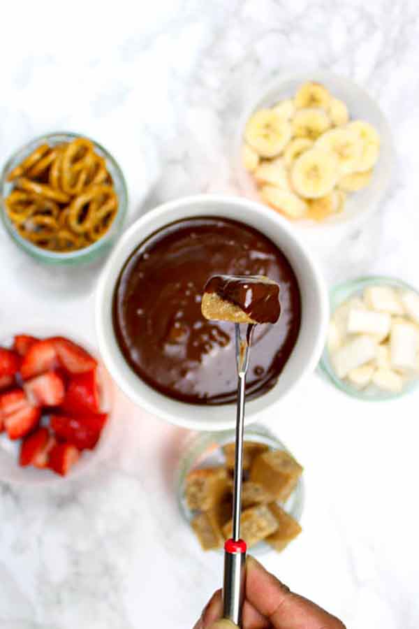 Image Of Vegan Fondue Surrounded By Dipping Snacks