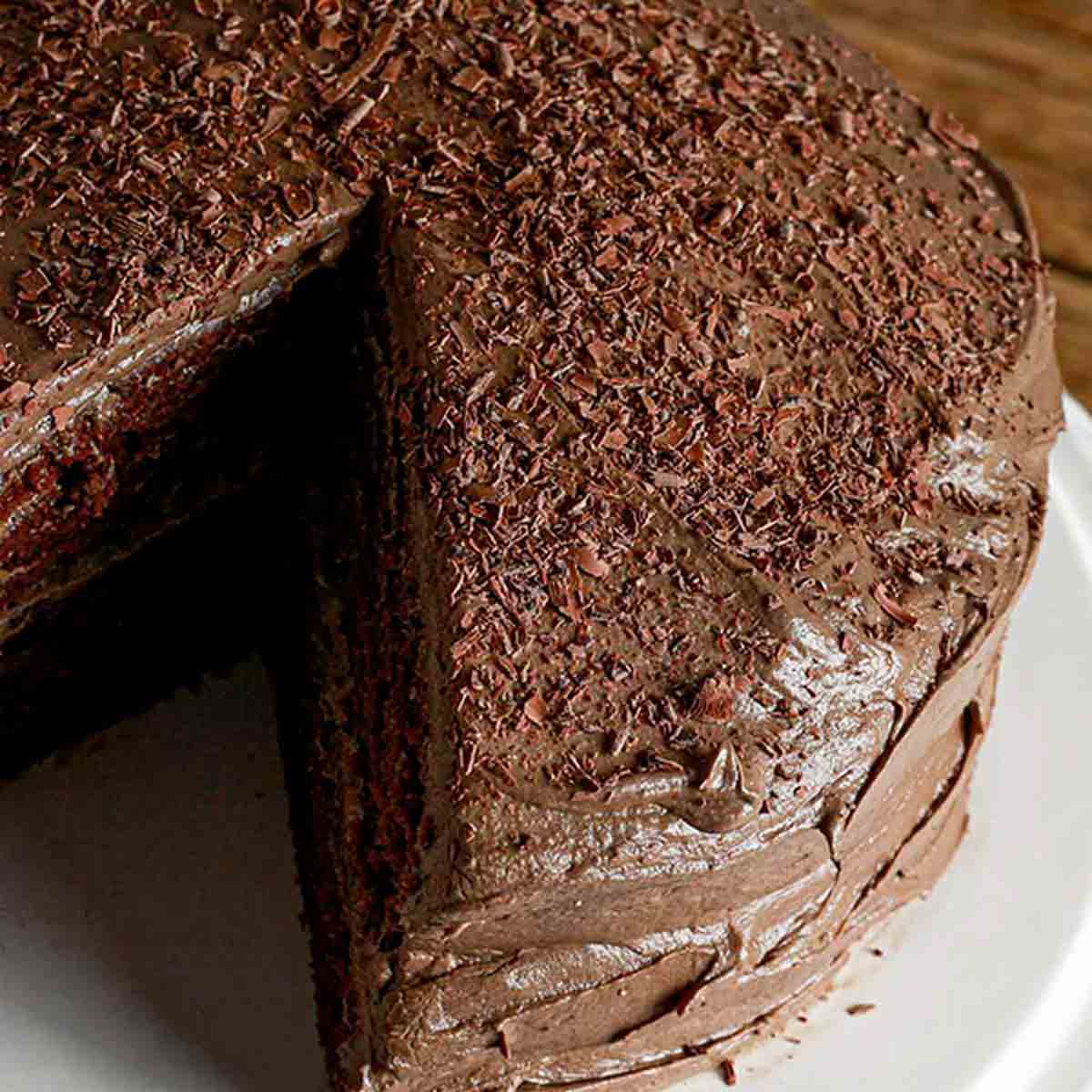 Eggless Chocolate Fudge Cake With Slice Taken Out