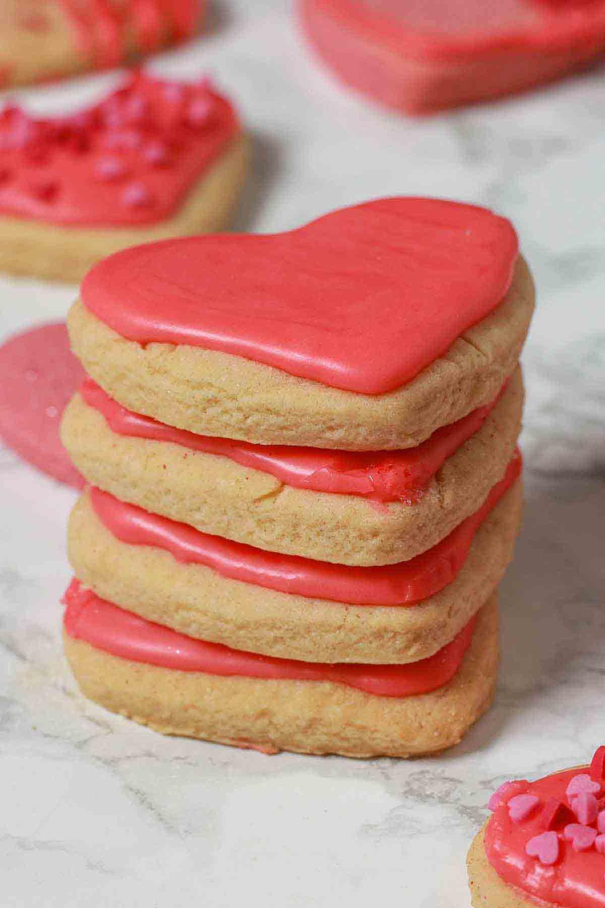 Stack Of frosted heart-shaped sugar cookies