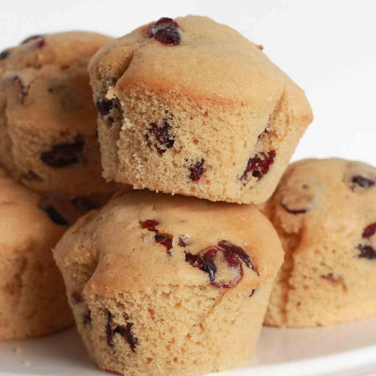 A Pile Of Vegan Cranberry Muffins