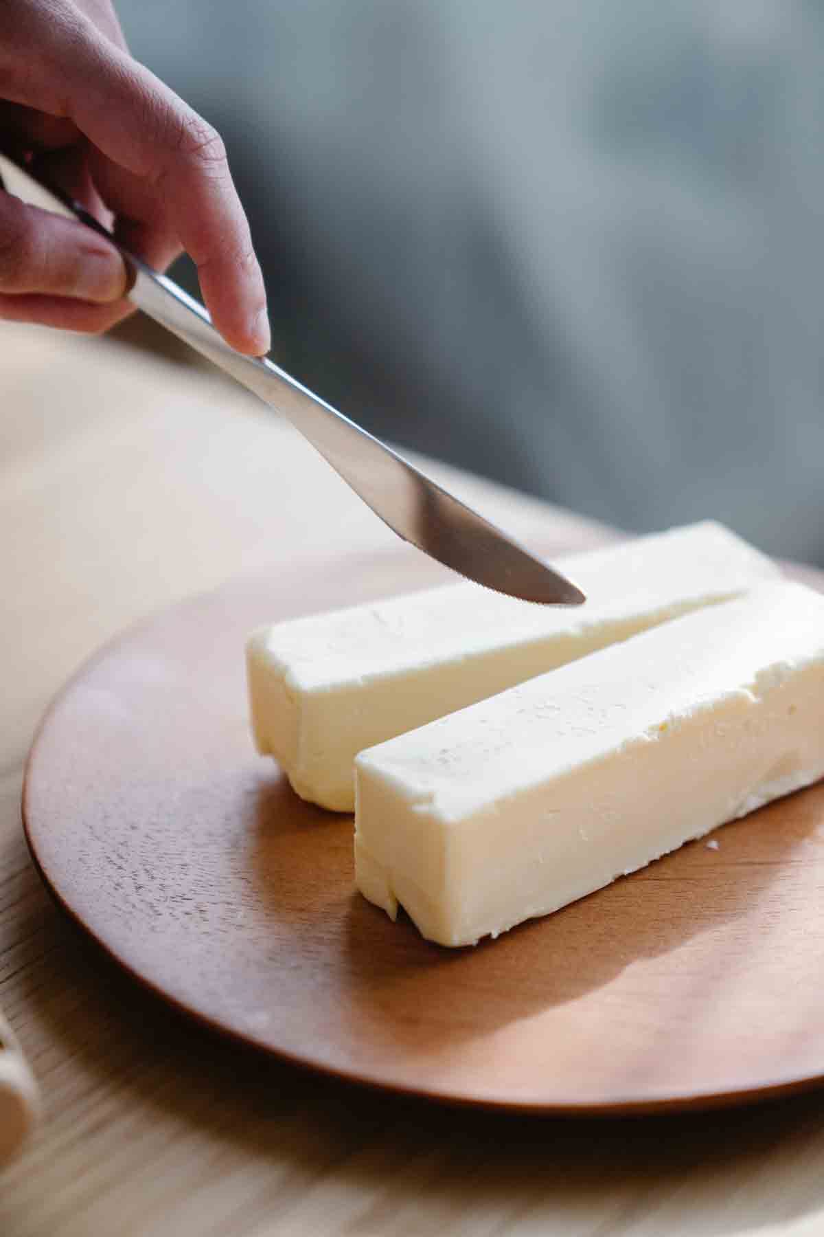 Cutting Into Sticks Of Butter For Baking