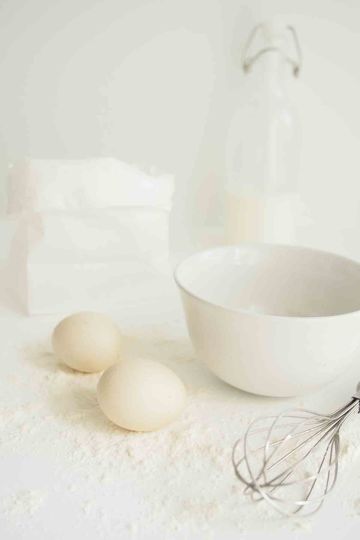 Eggs, Flour, Bowl And Whisk