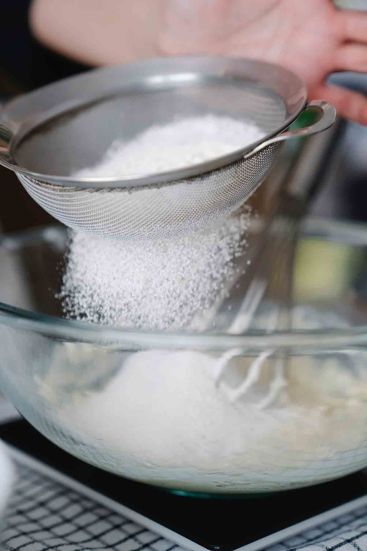 Sifting Self Raising Flour Into A Bowl