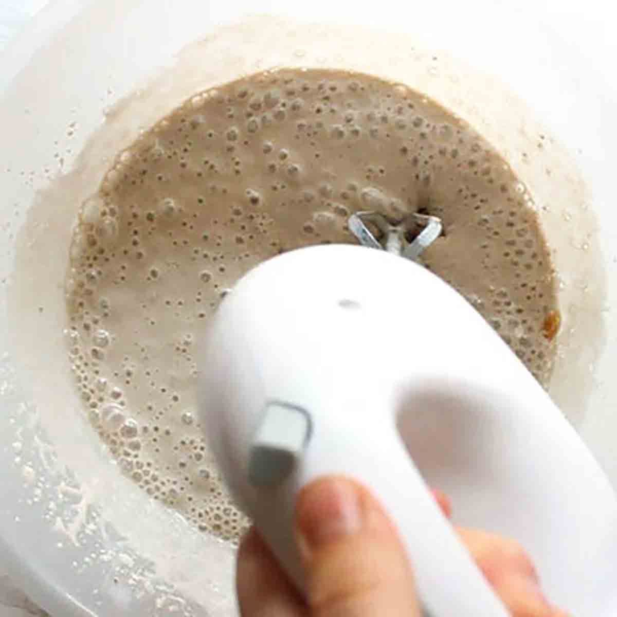 Whisking The Ice Cream Mixture In A Bowl