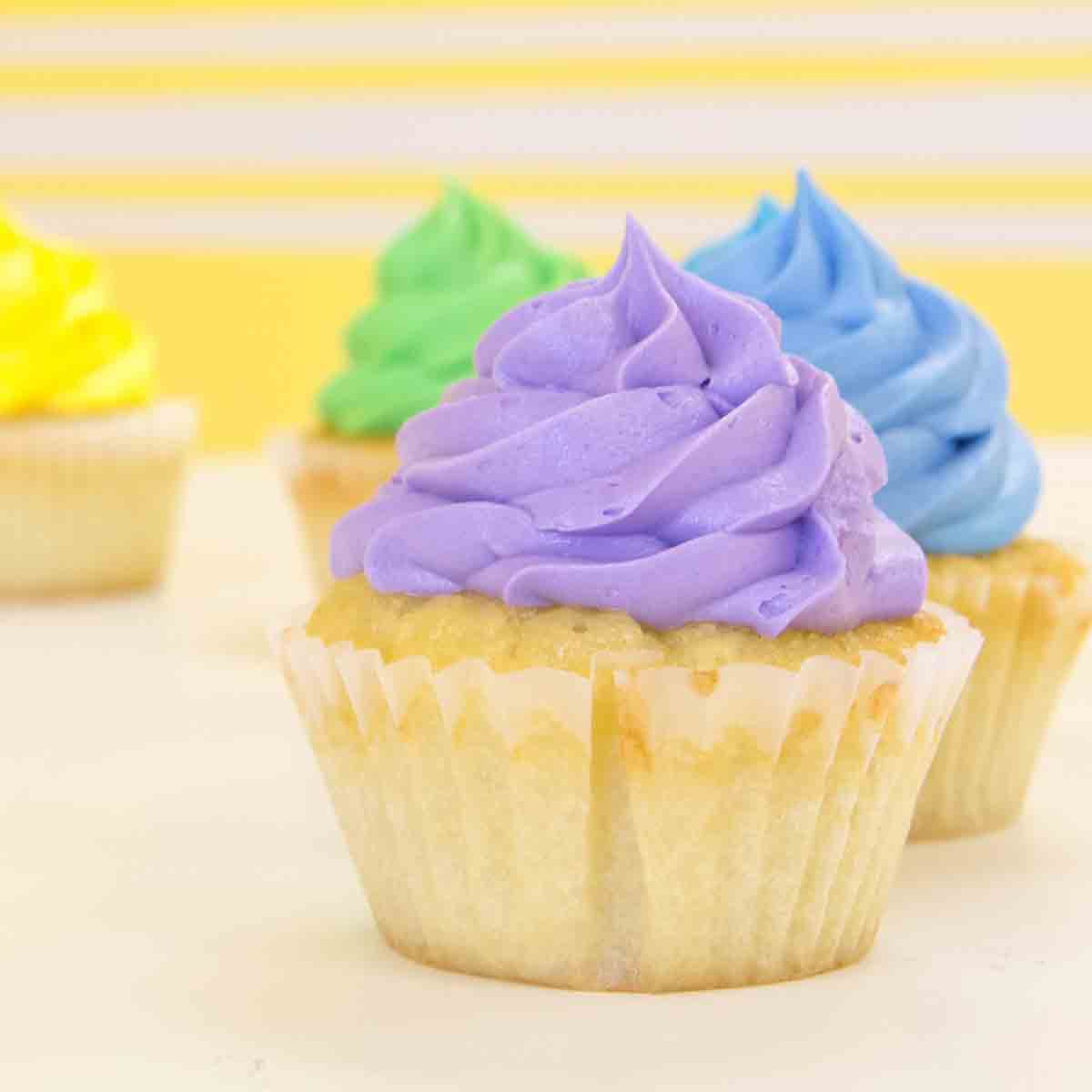 Cupcakes With Different Colours Of Frosting On Top