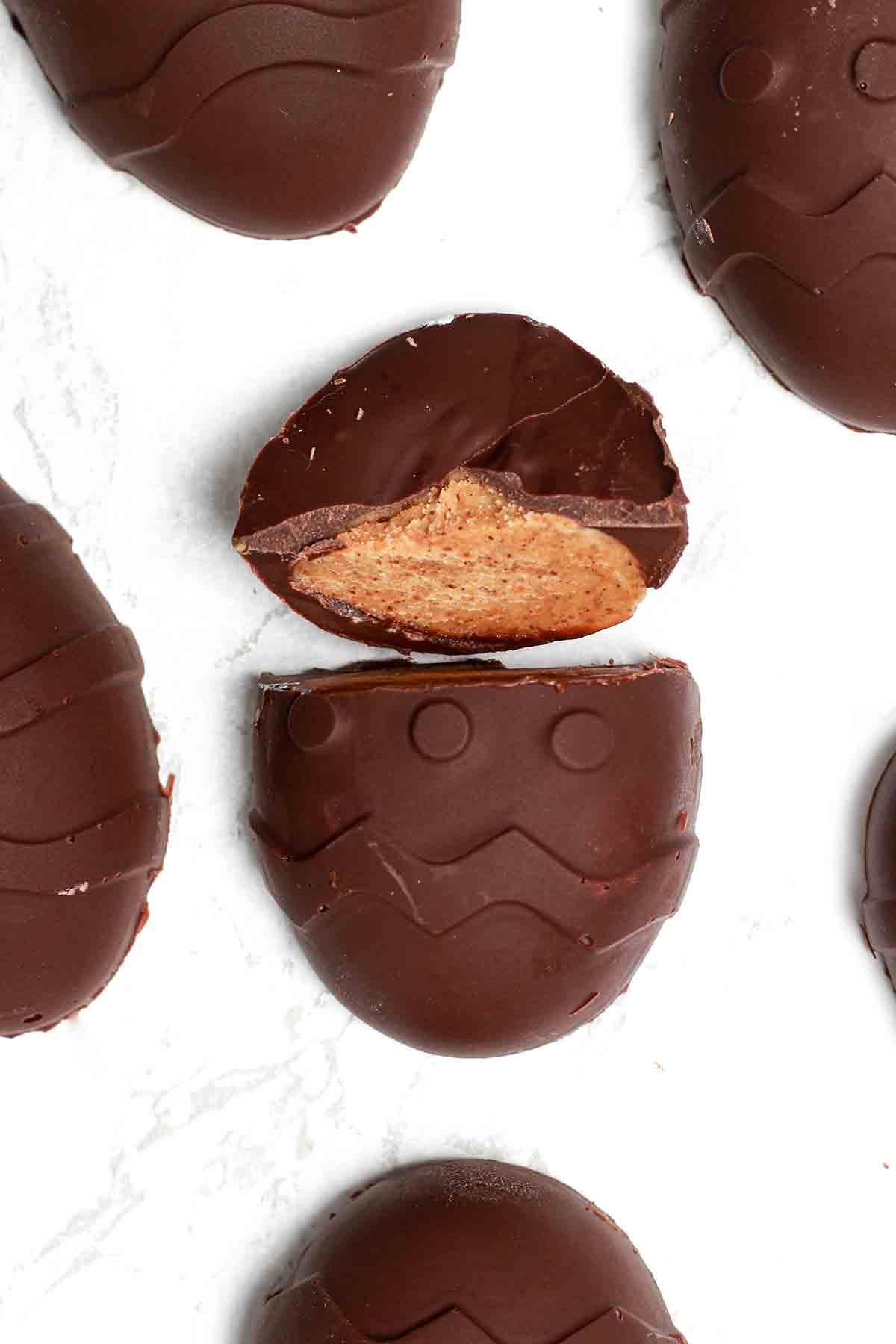 Dairy Free Chocolate Peanut Butter Eggs On A White Surface