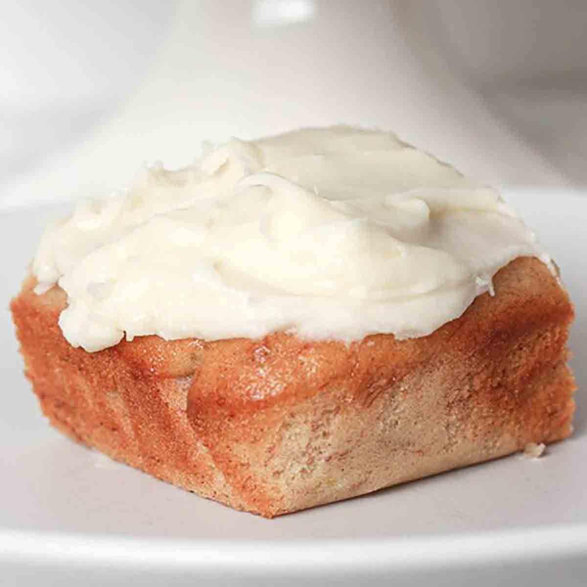 Vegan Baking Cream Cheese On Top Of A Slice Of Cake