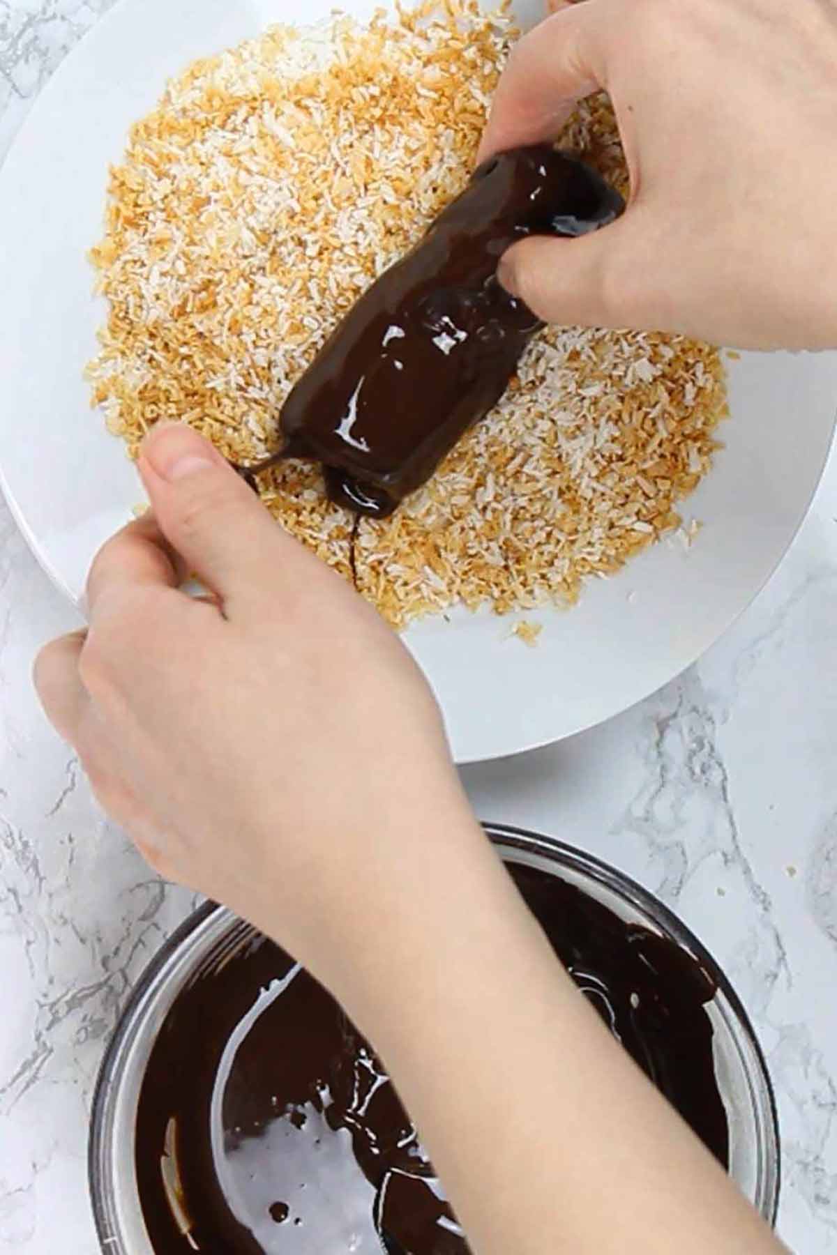 Covering The Scottish Macaroon With Coconut