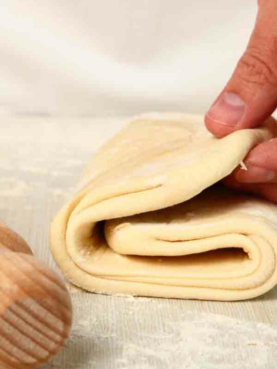 Folded Block Of Vegan Puff Pastry On A Surface
