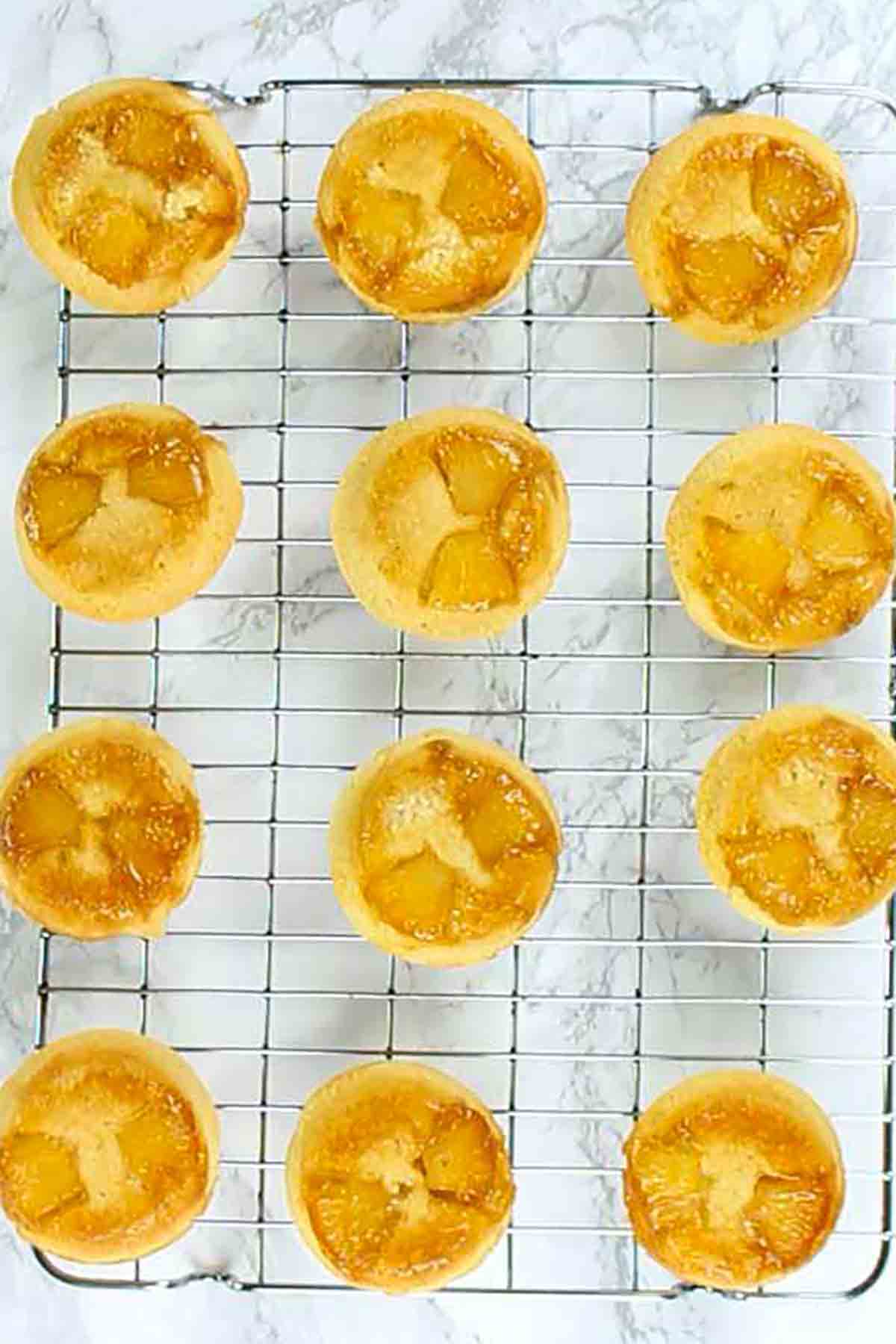 Vegan Pineapple Upside Down Cupcakes On A Wire Rack