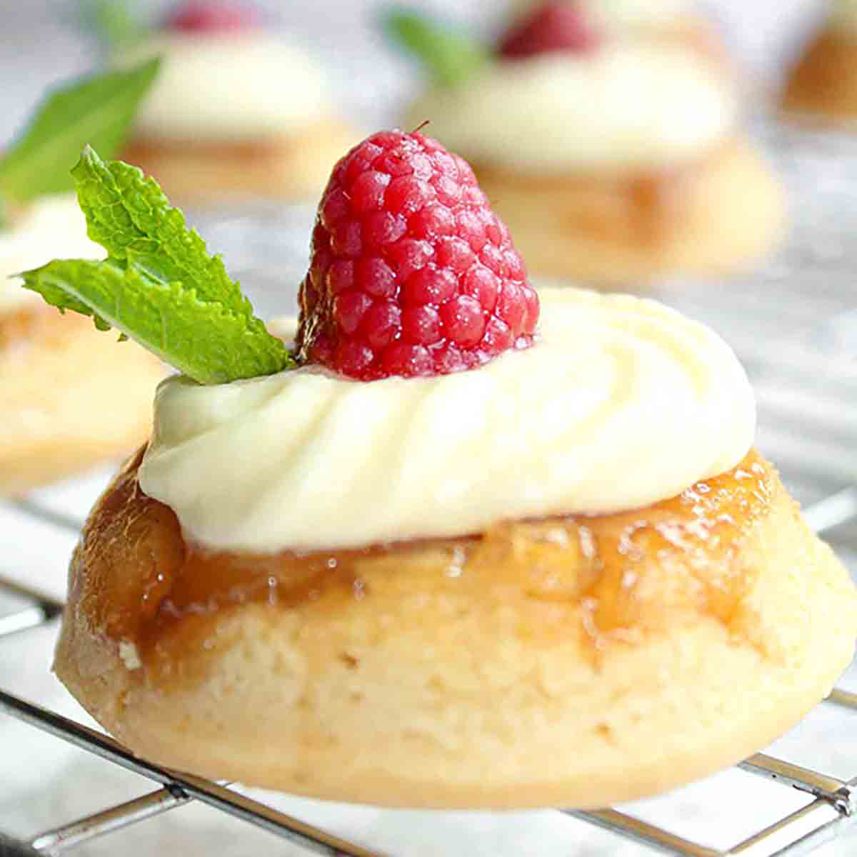 Vegan Pineapple Upside Down Cupcakes on a wire rack