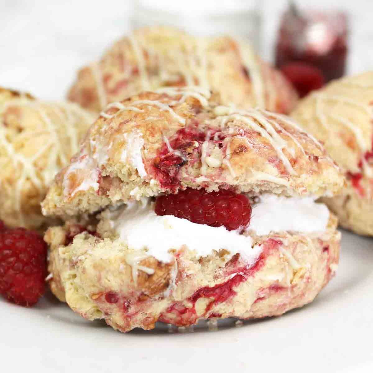 Image Of A Vegan Raspberry Scone Filled With Cream