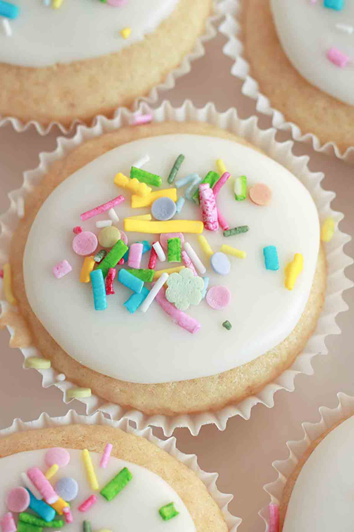 Colourful Sprinkles On Top Of Mini Vegan Fairy Cakes