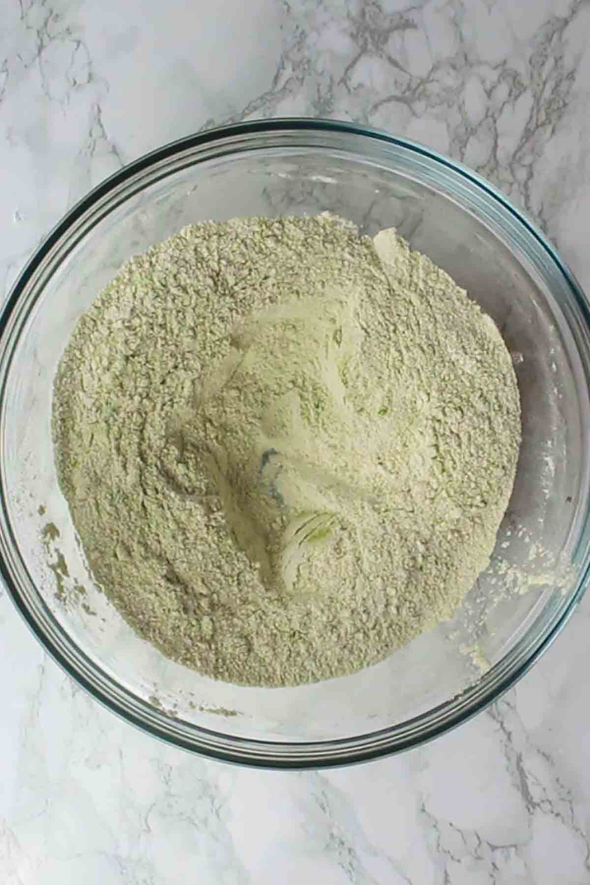 Dry Mixture In Bowl With Matcha Powder