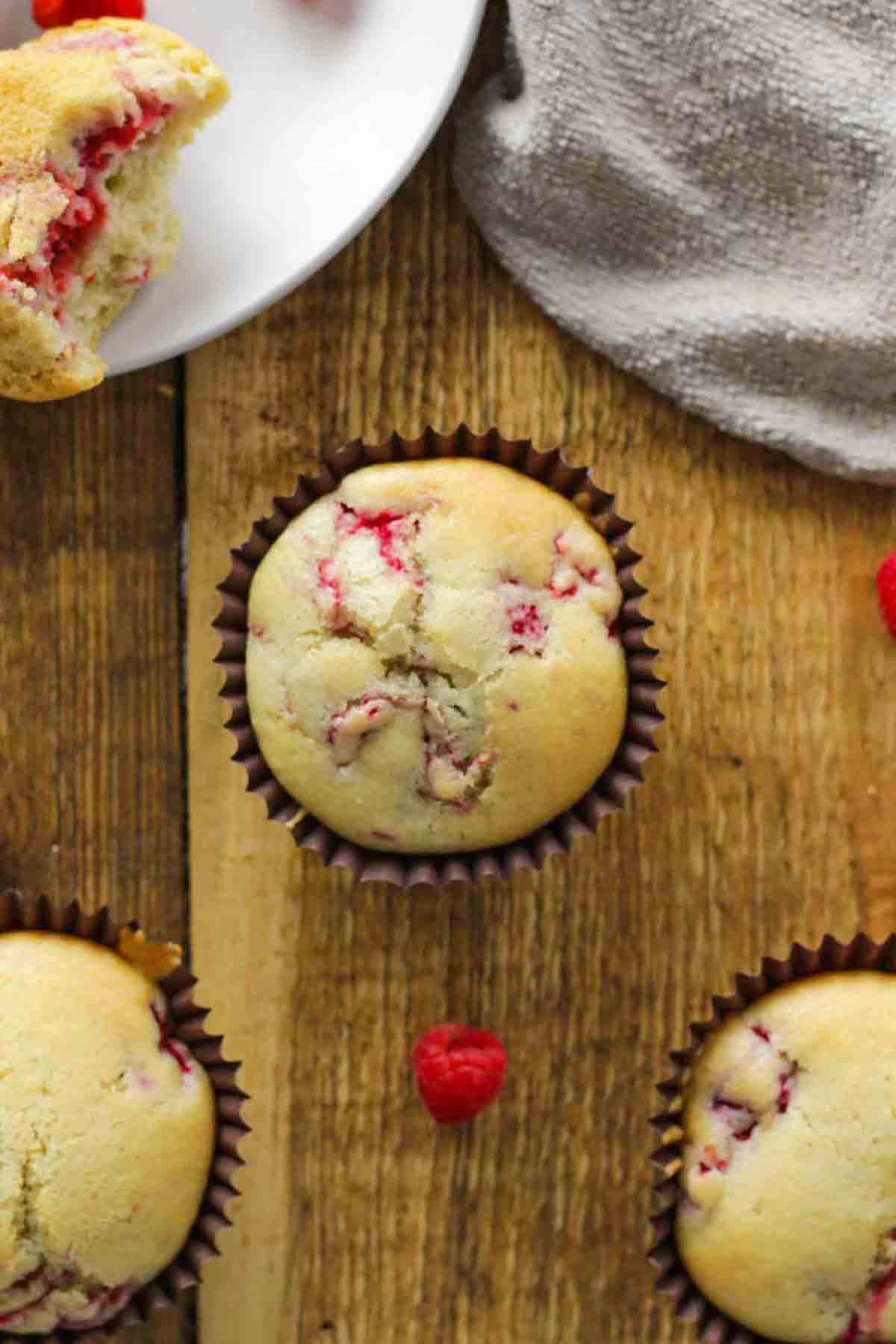 Overhead Shot Of Dairy Free Raspberry Muffins On A Table