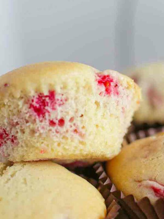 Stack Of Vegan Raspberry Muffins